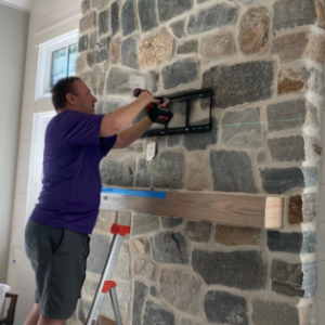 Install above stone fireplace